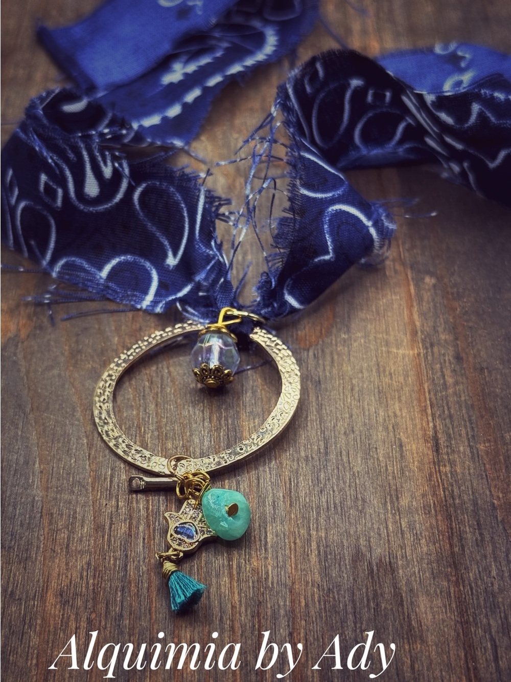 Sculptural Gold Hoop Necklace with Turquoise Charm and Blue Ribbon